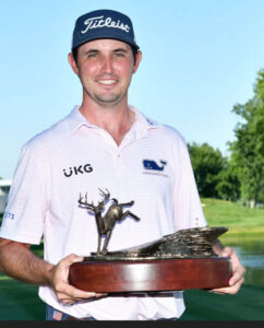 JT Poston with John Deere trophy