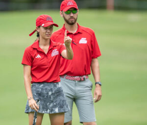 Ashley Stevenson and JSU women's golf coach Robbie Felds