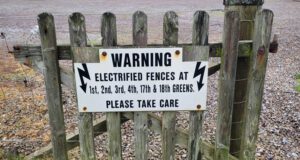 Warning sign on electrical fence