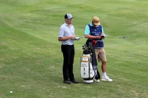 Robbie Shelton and caddie