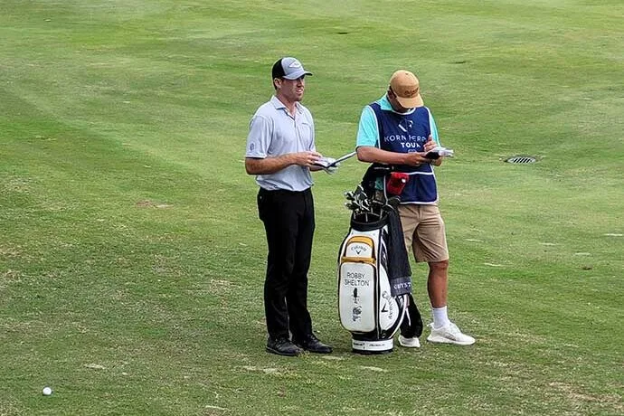 Robbie Shelton and caddie