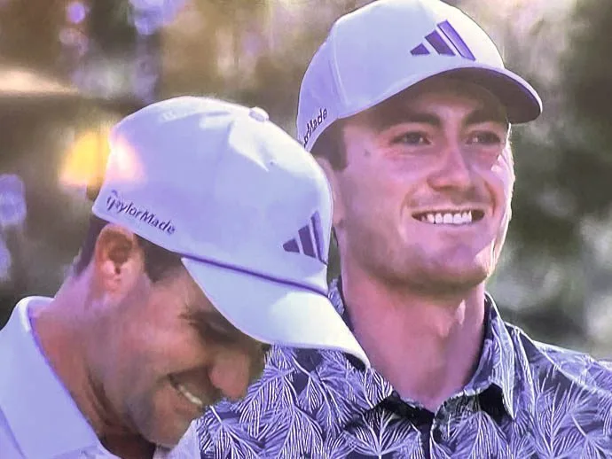 Nick Dunlap with caddie