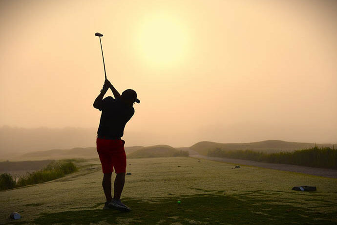 Myrtle Beach World Am golfer at sunrise