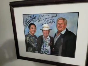 Photo of Chi Chi Rodriguez and wife and Bennie Smallwood