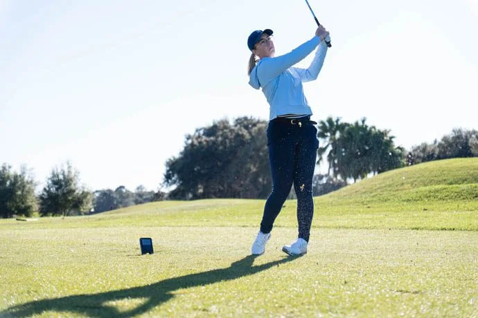 A player using the SHot Scope LM1 launch monitor on the golf course